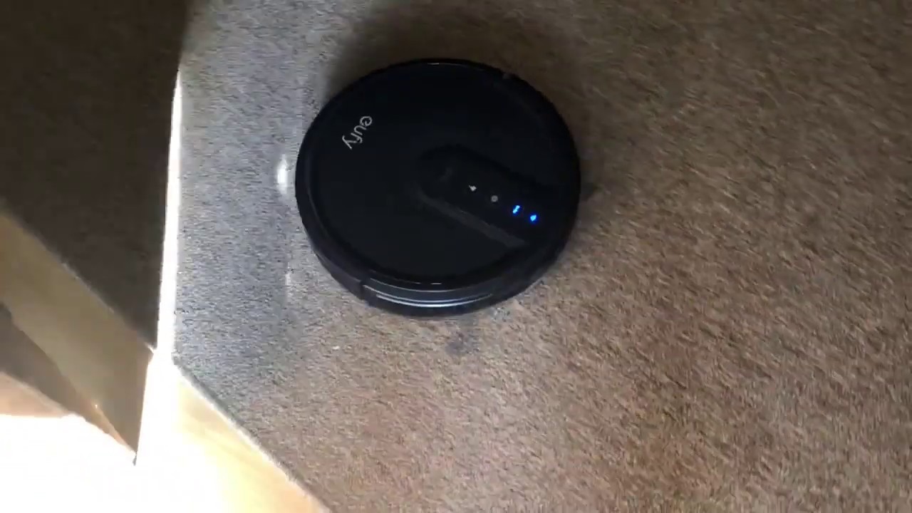eufy Robovac 25C Cleaning carpet with MM candies and paper peices